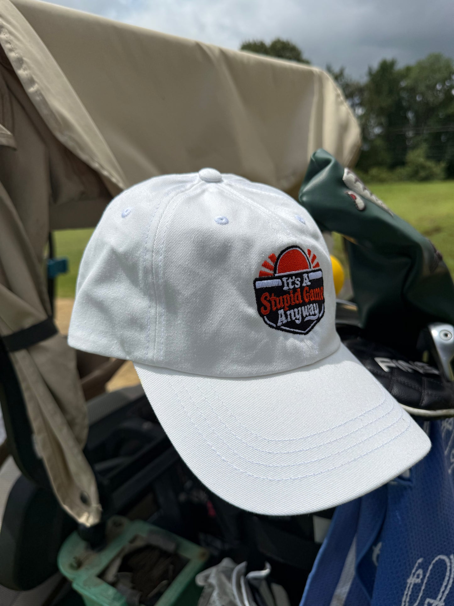 The Sun Hat – Its A Stupid Game Anyway hat with a golf ball sun