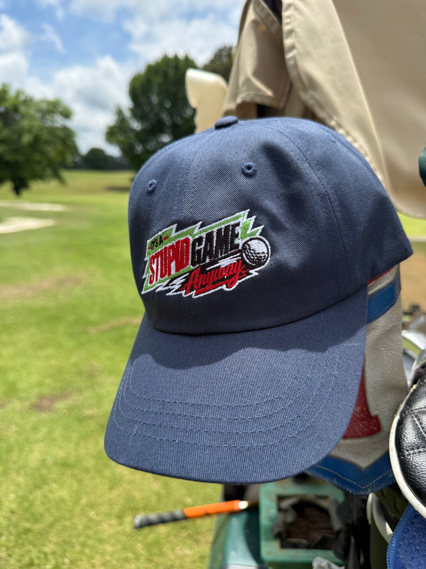 The Dew Hat – Its A Stupid Game Anyway hat with Mountain Dew theme